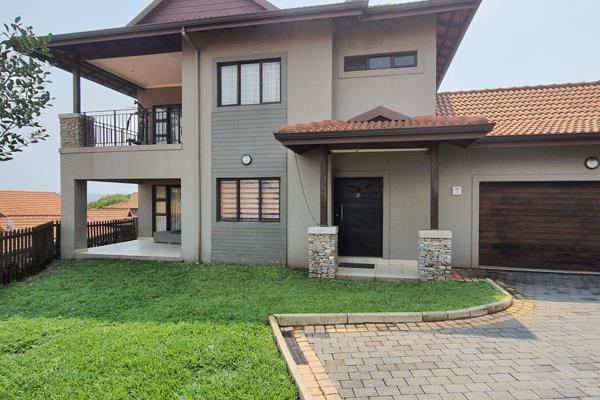 An absolute must see meticulously maintained 4 bedroom townhouse in elite Emzini Estate Izinga.  Lounge, dining, kitchen, open plan on ...