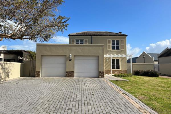 This Lovely Secure Family Home offers:

Downstairs: 
•	Lounge with fireplace and sliding door leading to the back yard/garden
•	Kitchen ...