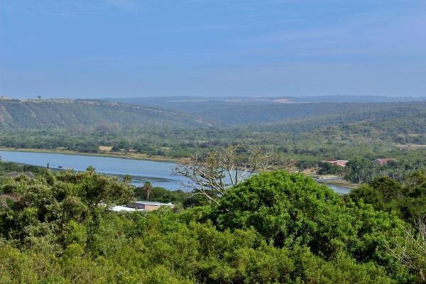 This sloping plot with a north facing aspect has magnificent views of the Kowie River ...