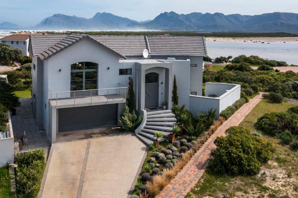 JOINT MANDATE - Situated where the Bot River Estuary connects to the ocean – this beautiful home with exquisite views over the lagoon ...