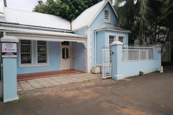 A charming little house with lots of character close to all amenities, schools and ...