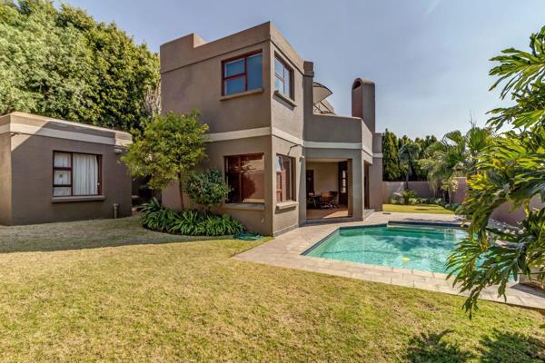 Downstairs: Covered patio entrance with large solid wooden front door, entrance hall ...