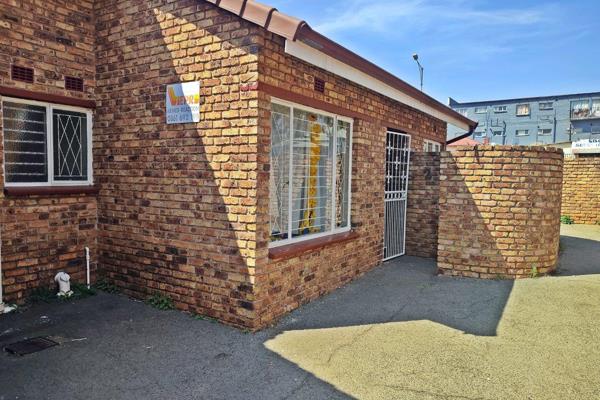 This beautiful face-brick townhouse is based in Krugersdorp Central on 80sqm offering 2 spacious bedrooms with built in cupboards, 1 ...