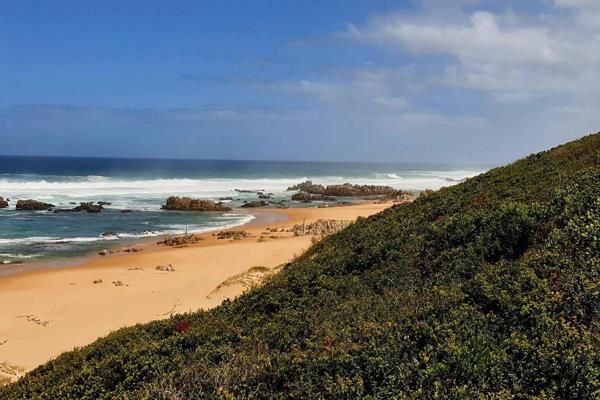 Imagine your home with a deck stretching over the dunes, right on the beach.
Imagine sipping your morning beverage looking at the sun ...