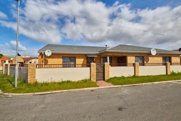 Welcome to this impressive single-story corner house, boasting a commanding presence with its facebrick exterior that exudes timeless ...