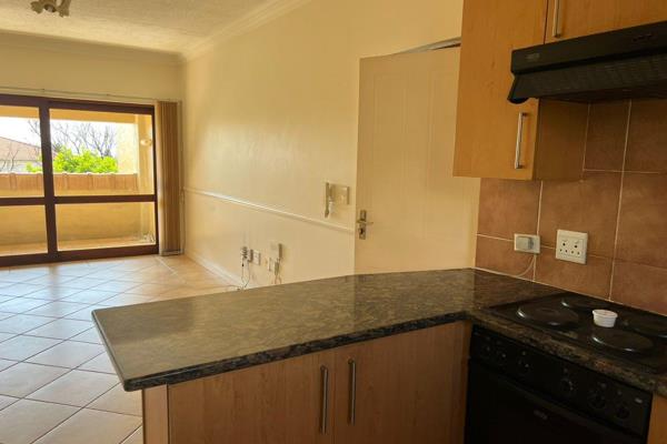 First floor apartment in secure, well established complex. The kitchen includes built in ...