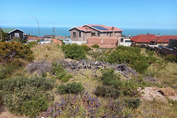 Lovely sea view corner stand -  easy to build on.  
Foundation done and the garage has been built roof height.

Plans approved.
Bricks ...