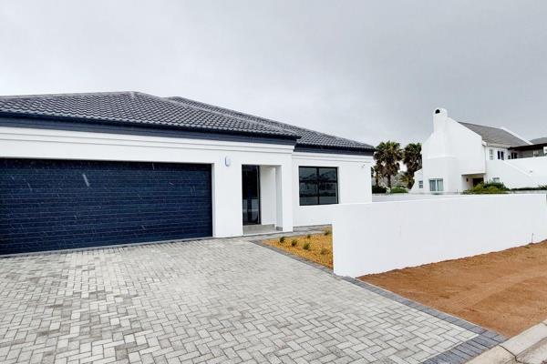 This appealing house is situated in the very popular Sandy Point Beach Estate.  The ...