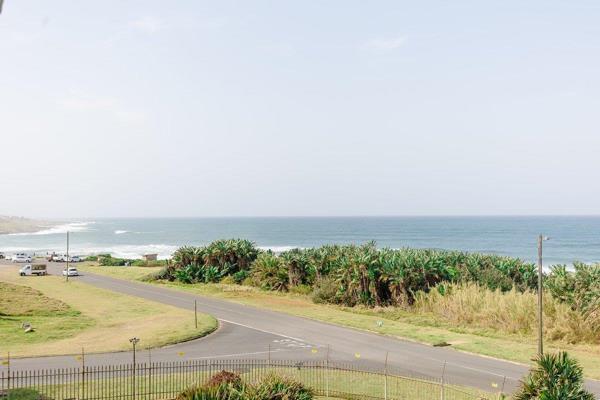 Perched on the top floor of a well run complex, this two-bedroom beachfront apartment offers a serene coastal lifestyle. 

There are ...