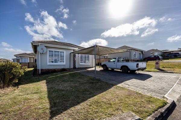 This neat townhouse offers an open plan living area with easy access to the kitchen and bedrooms. The welcoming kitchen has built-in ...