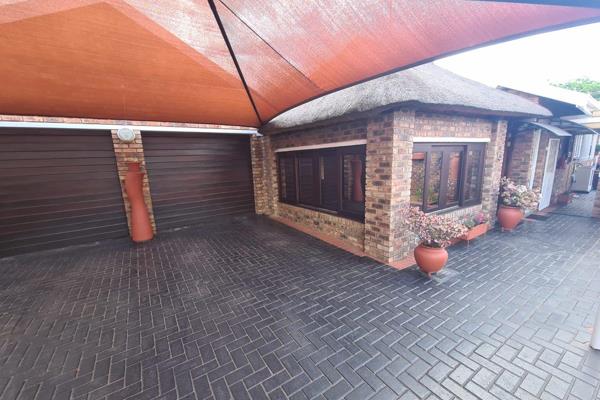 - Double garage with automated doors + 4x Carport parking spaces
- Private courtyard
- Thatched lapa (enclosed &amp; fully tiled)
- ...