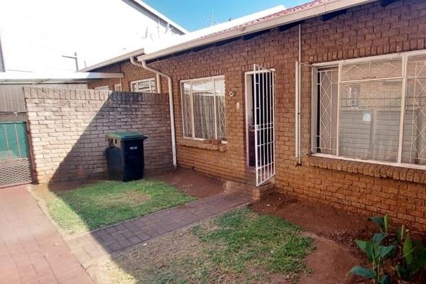 Comfortable two bedroom, one bathroom townhouse with a small garden suitable for a small family in a secure complex.