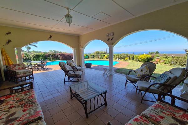 Step into a world of comfort and spacious elegance with this grand family home overlooking the ocean. Centrally located, a quick drive ...