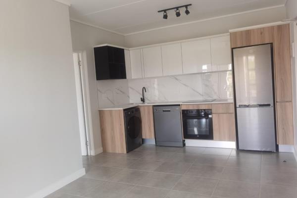 One bedroom, one bathroom apartment in Waterfall. Open plan kitchen and dining area, which includes eco-friendly appliances (fridge ...