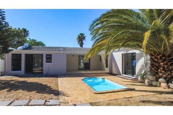 Nestled in the heart of Blouberg Sands, this impeccably renovated residence is set to ...