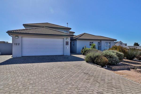 Welcome to this stunning 4-bedroom, 4-bathroom home in the desirable Myburgh Park ...