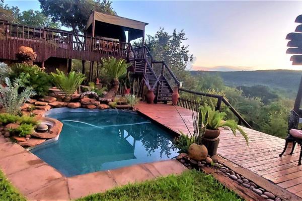 View by appointment only!

Nestled within a private game lodge, this immaculate residence exudes a sense of refinement and charm. It ...