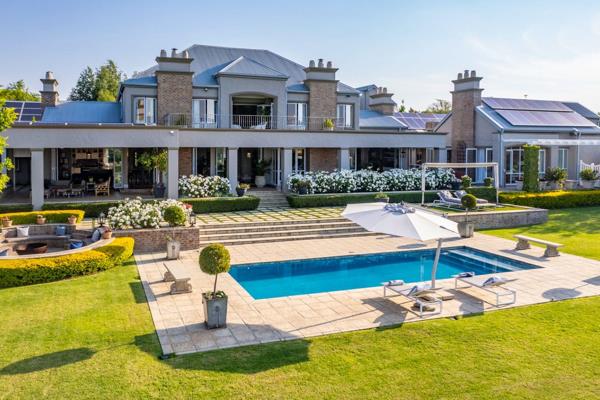 Immerse yourself in an authentic French Provincial mansion meticulously designed and set against the prestigious backdrop of South ...