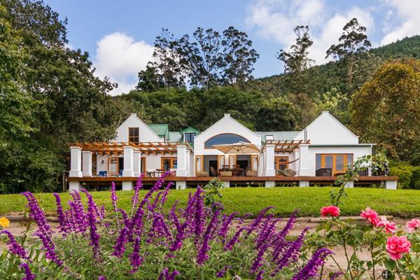 Steeped in Knysna&#39;s rich heritage, this iconic property unfolds as a stunning piece ...