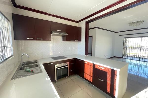 Breakfast nook, fully tiled open-plan kitchen with Caesar stone countertops, enough for 2 undercounter appliances, and a ton of cabinet ...