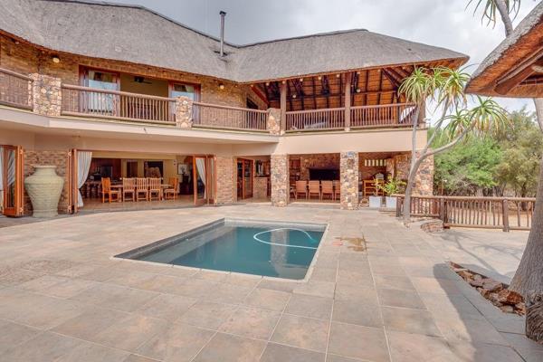 This paradise in the bush is a gorgeous 6 bedroom home that offers an amazing ...