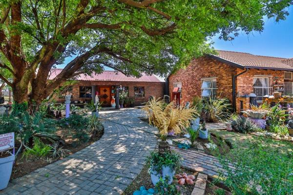 Welcome to this exceptional 13,000 square meter property that combines the best of country living with the promise of lucrative rental ...