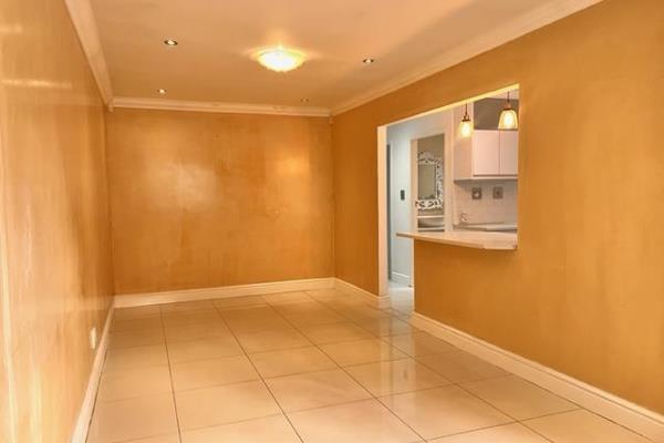 Unfurnished, renovated two bedroom home with modern open plan kitchen and lounge.  The kitchen is fitted with built-in cupboards and ...