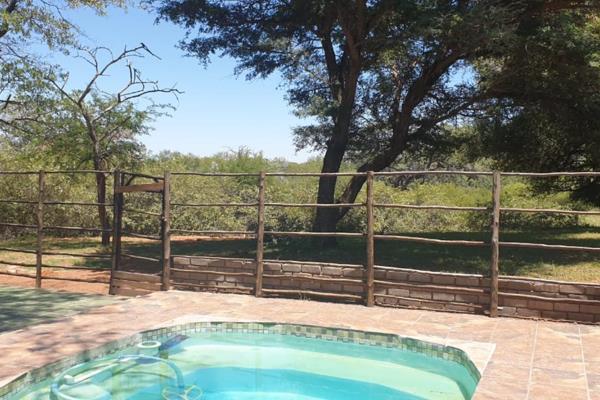 Nestled on the fringes of the untamed bushveld in Leeupoort, a stone&#39;s throw away from Thabazimbi, this charming property is a ...