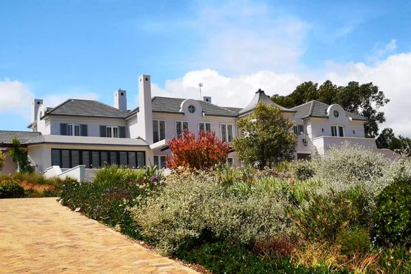 Nestled in the serene rural landscape of Somerset West, this grand home exudes splendour and elegance. 

Boasting a refined French ...