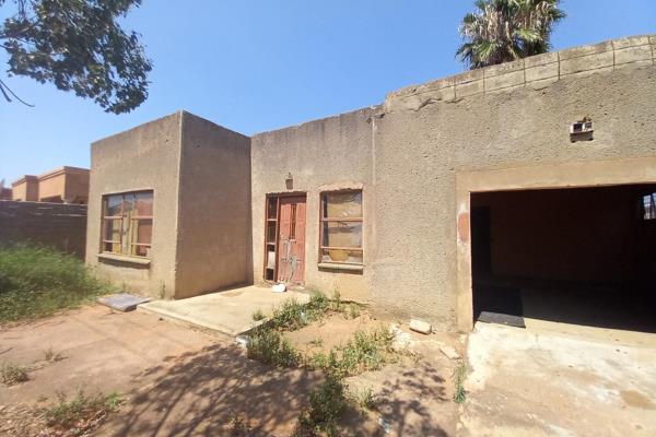 A 2 Bedroom unfinished house, with a kitchen, dining room, toilet and a garage. Has a big yard and secured with a wall fence and gate. ...