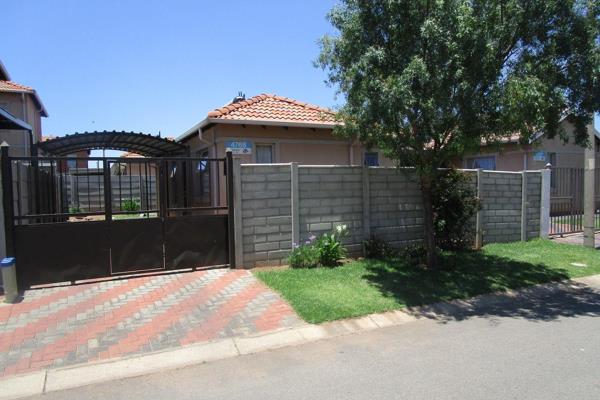 Modern  Three Bedroom House  with Open Plan Living Area and a Carport  in sought after- ...