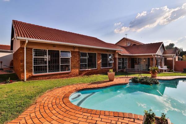 Discover this unique family home situated on a spacious corner stand, featuring a fully ...