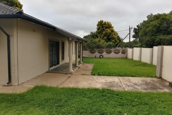 A stunning 4-bedroom property for sale in Vryheid with a fitted kitchen, lounge, dining area, bathroom, shower, pantry, outdoor ...