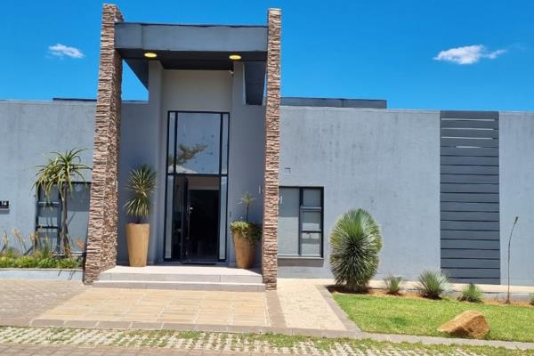 Discover the epitome of modern living in a security Estate in the northern suburbs of Bloemfontein. This lovely 519sqm  home offers you ...