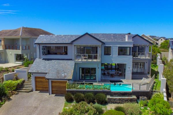 This is the lifestyle you dream of. This modern southwest-facing house in the sought-after Pezula Golf Estate is perfect for a family ...