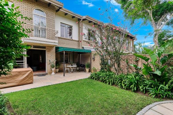 This home invites sophisticated entertainment as well as easy contemporary family life.  Lush lawns and cluster of mature trees ...