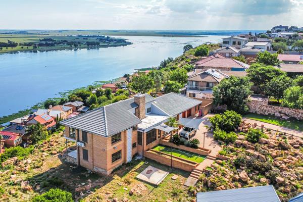 Located close to launching area in Aquavista Mountain Estate and overlooking Bronkhorstspruit Dam, this exceptional home offers an ...