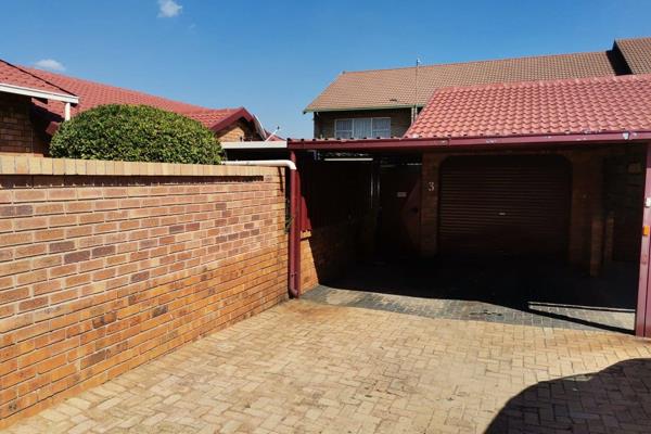 This secured unit is in a small pet friendly face brick complex  
It is spacious with  ...