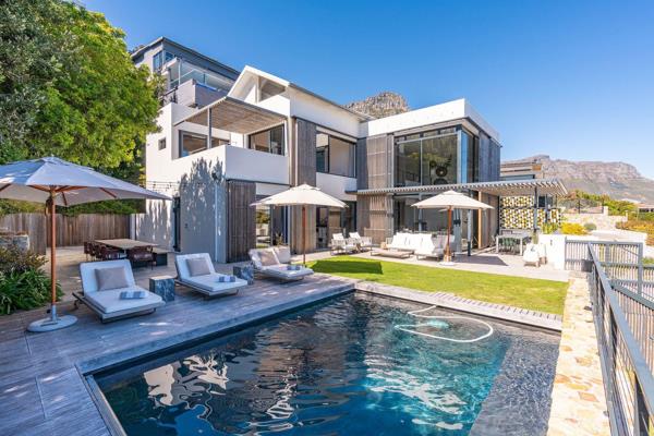 Welcome to our modern, open-plan, and spacious Airbnb Villa with breath-taking sea views and a refreshing pool. Located in Camps Bay ...