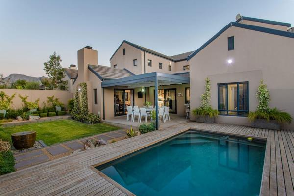 Exclusively marketed - This property offers the pinnacle of estate living in the breathtakingly beautiful Cape Winelands. With its high ...