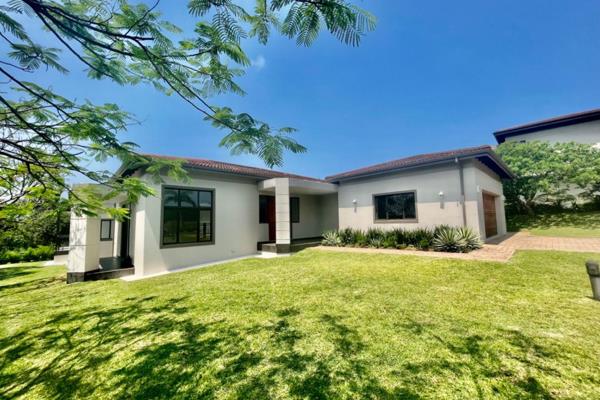 Step through the double garage and enter into the heart of this residence, a vast kitchen boasting generous cupboard space and a ...