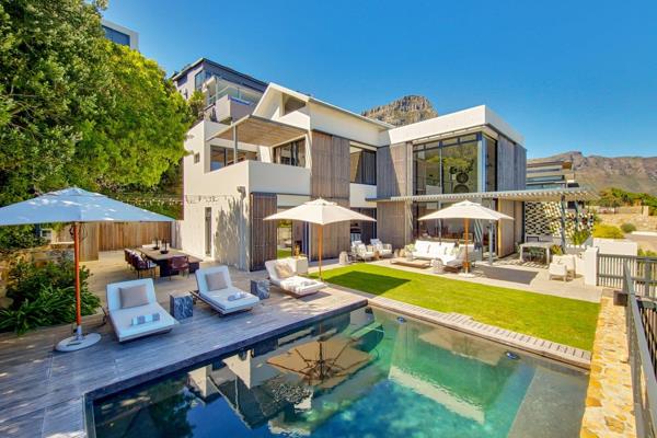 Indulge in the epitome of luxury with our breathtaking short-term rental nestled in the heart of Bakoven, Camps Bay. It&#39;s perfectly ...