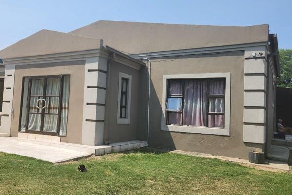 This impressive 4-bedroom house in central Standerton offers a spacious and modern living experience. The property includes two ...