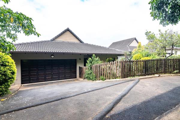 This single level gem offers a spacious open plan living area that extends seamlessly ...