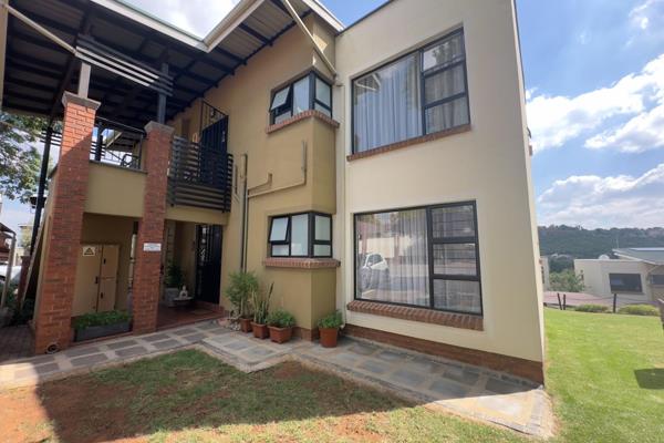 Ultra modern two bedroom two bathroom upstairs apartment with double carport in access controlled complex with state of the art ...