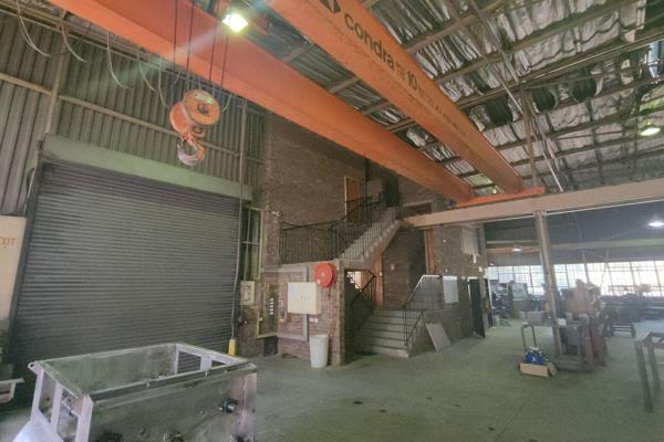 This warehouse is incredibly well equipped with a large over head crane as well as ...