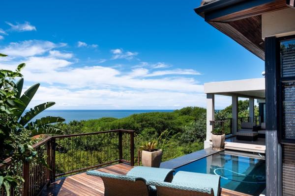 Prime home in Simbithi&#39;s Golf Estate with 180-degree Sea Views. The entrance level features an open plan living and entertainment ...