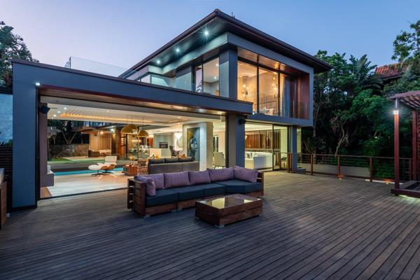 This Opulent home in the prestigious Zimbali Estate sits perched on an elevated site, with commanding ocean vistas, offering you the ...