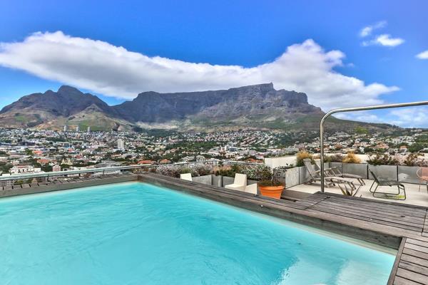 INVESTMENT OPPORTUNITY - sought after Air BNB penthouse in the vibrant Bo Kaap district of Cape Town. 

This exquisite three-bedroom ...