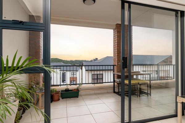 Situated in the sought-after Ballito Hills estate, this upper-level apartment is a true gem, exuding warmth and charm. Its open-plan ...